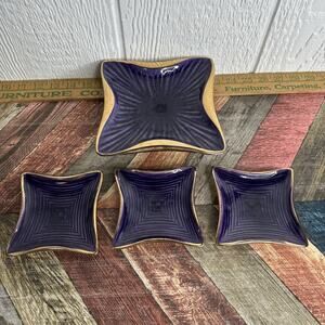 Dick Knox California Pottery square dishes in a deep purple glaze with gold trim